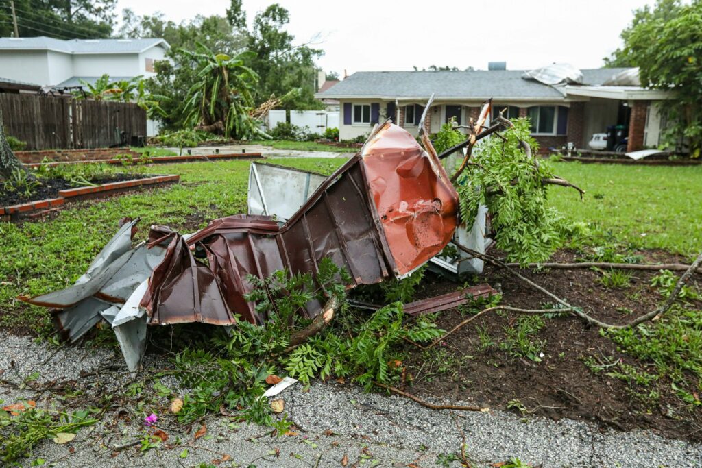 destroyed red and black outdoor grill